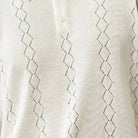 white short sleeve woven knit polo with vertical textured pattern fabric details