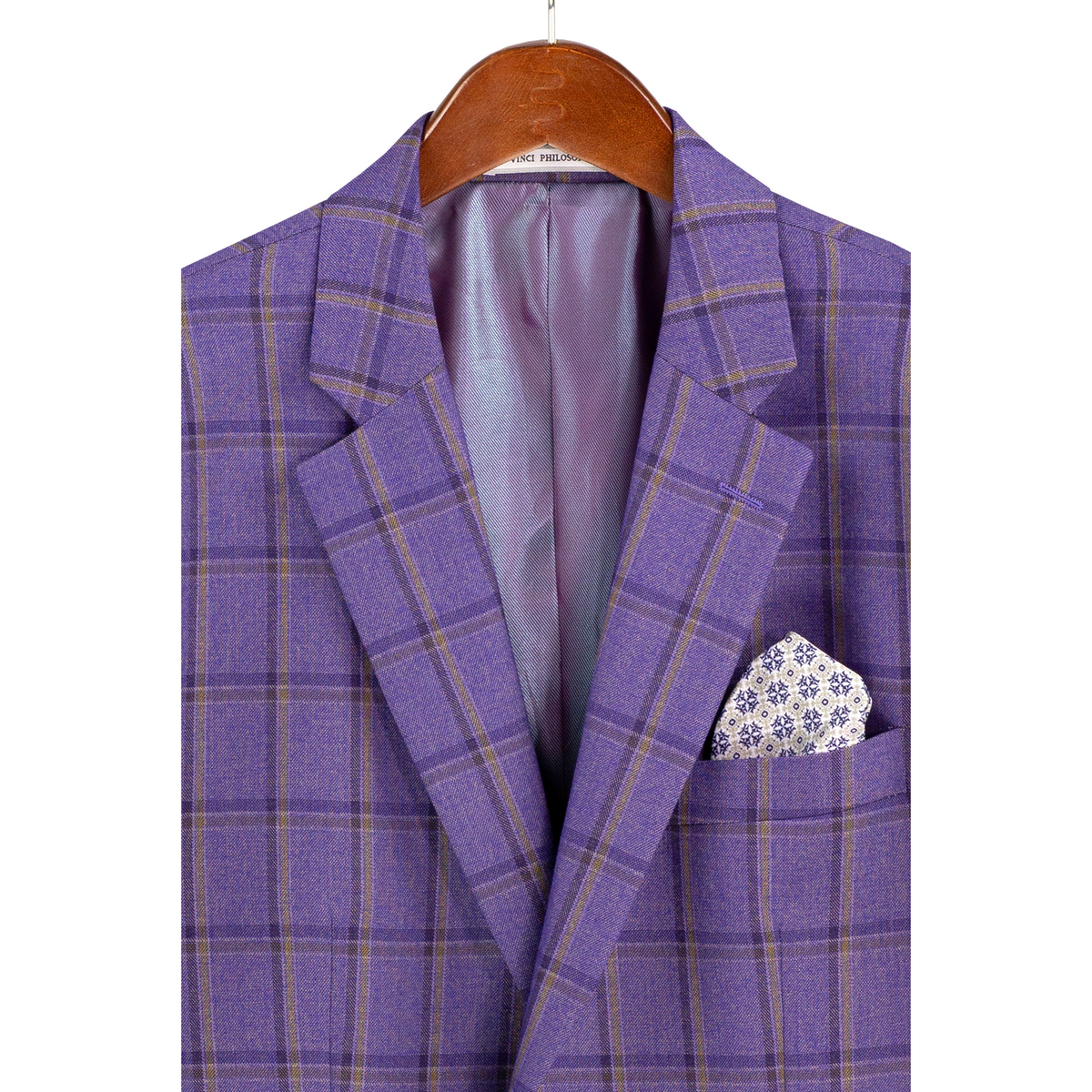 Close-up of the purple windowpane plaid jacket on a hanger, showing notch lapels, chest pocket and lining.
