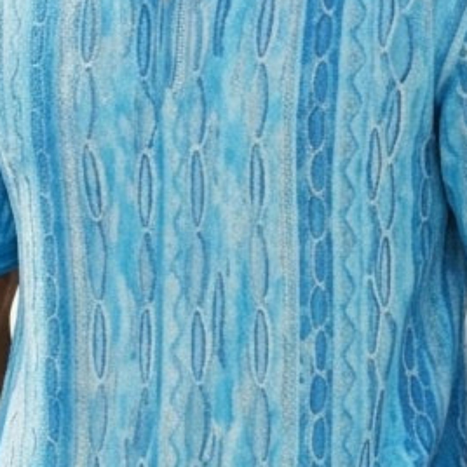 Close-up of TURQUOISE wavy textured knit walking suit shorts set fabric detail