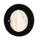 White and black H-101 felt fedora by Montique - top view of pinch crown and brim