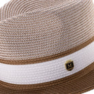 Close up of cappuccino wide brim straw fedora hat pinch crown