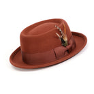 Cognac H-88 wool felt pork pie hat by Montique - angled view with feather accent and short brim