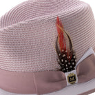 Side view of blush and white Montique fedora hat with ribbon and feather