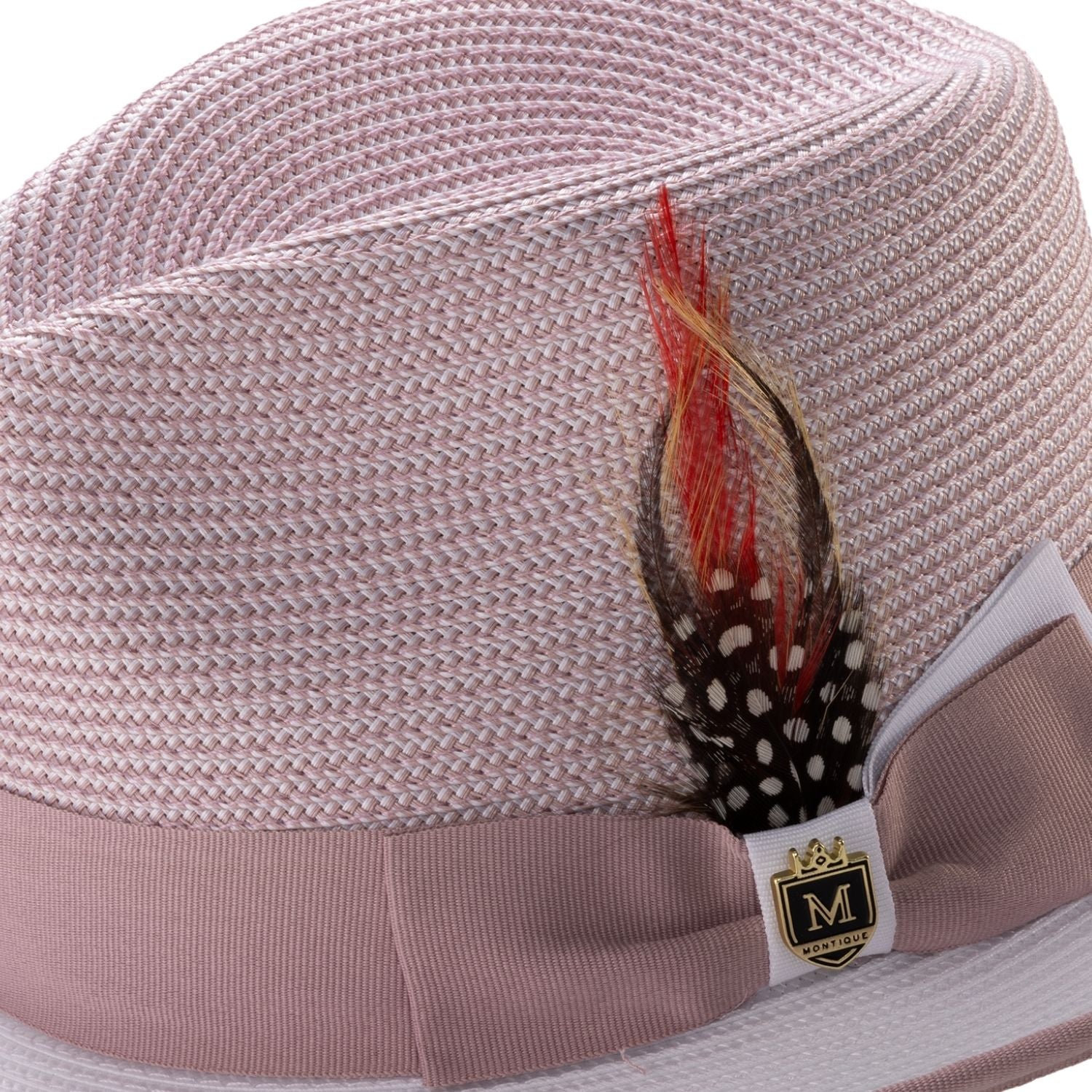 Side view of blush and white Montique fedora hat with ribbon and feather