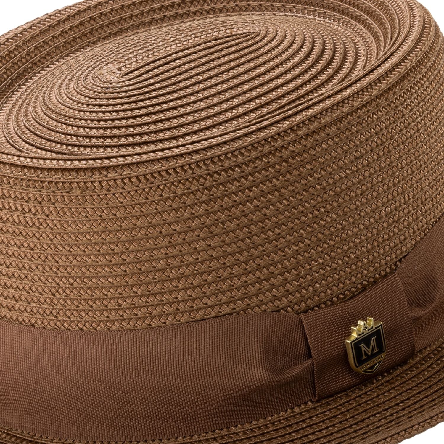Close-up profile of the Montique Protostar cappuccino pork pie hat showing the structured short-brim design.