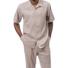 Side view of a male model wearing the oatmeal linen look walking suit and matching trousers.