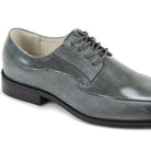 Close-up of gray embossed leather texture and moc toe stitching detai