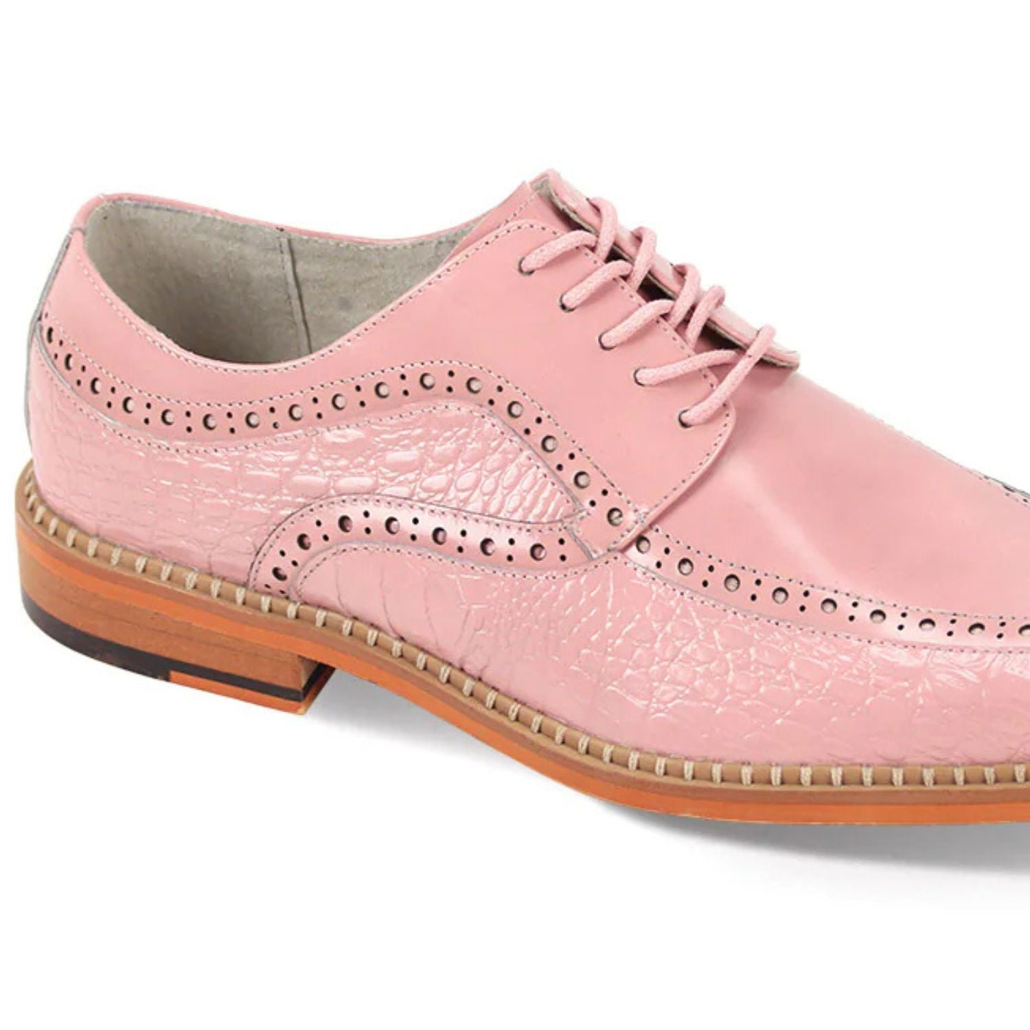 Close-up of pink embossed coco-print leather texture and moc-toe stitching detail
