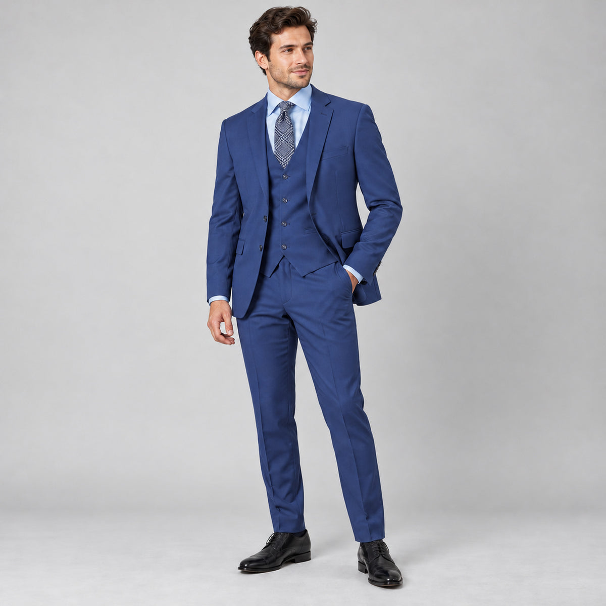 Blue three-piece slim fit suit, model view