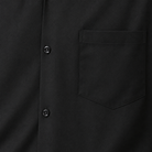 Montique black solid walking suit shirt chest pocket and front button close-up.