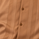 Montique camel vertical panel walking suit fabric button detail