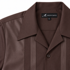 Montique chocolate vertical panel walking suit open collar label detail