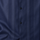 Montique navy vertical panel walking suit fabric button detail
