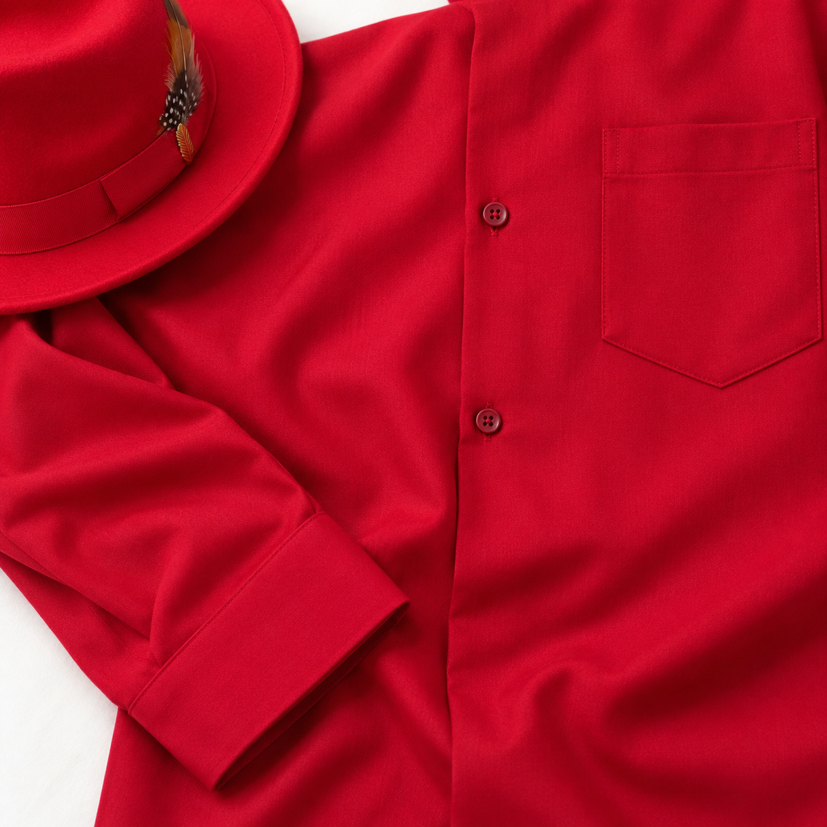 Montique red walking suit pocket and cuff beside red fedora styling accessory