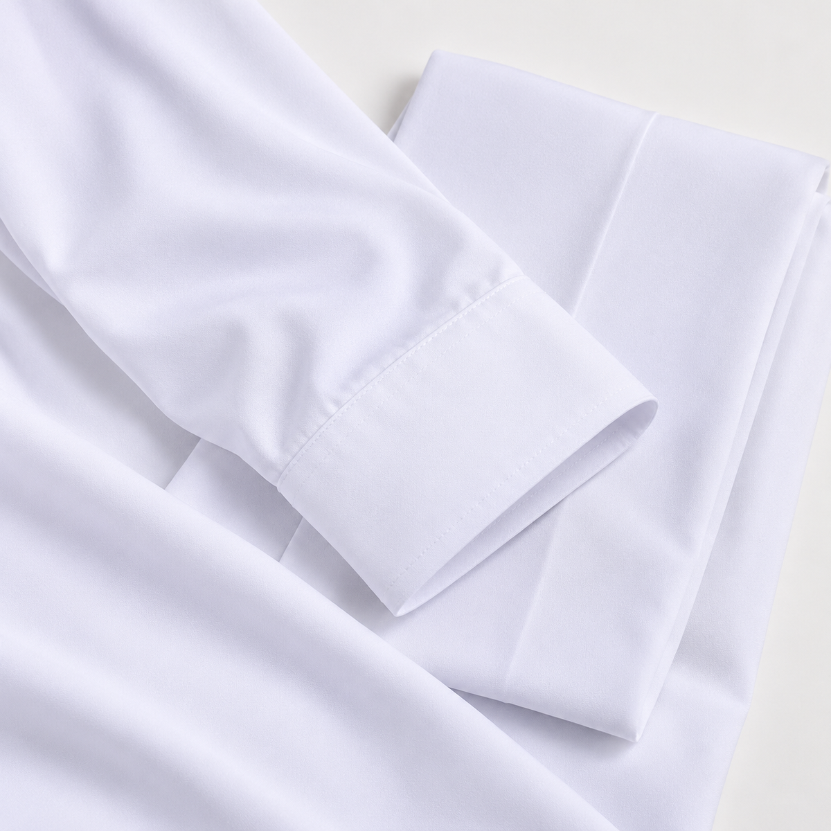 Montique white solid walking suit sleeve cuff and matching folded trousers