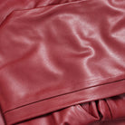 Burgundy Montique P026 Folded leg and hem detail