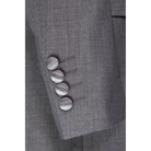 Close-up of the light grey jacket sleeve, showing four satin-covered cuff buttons and woven fabric.