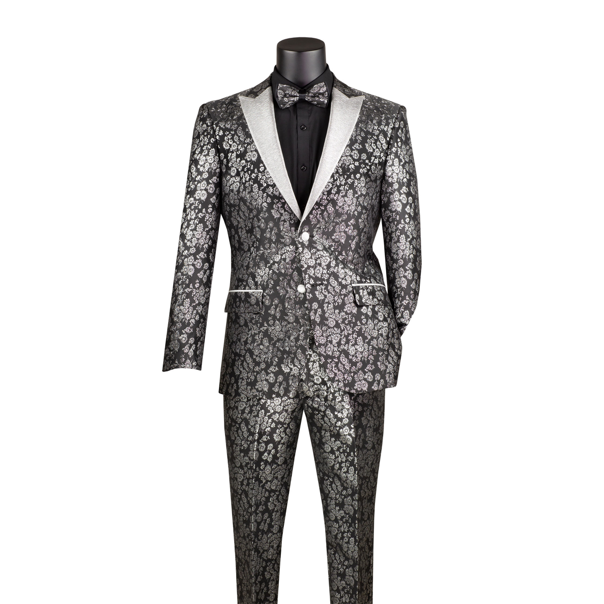 Black and silver floral jacquard tuxedo with contrasting silver shawl lapels and patterned trousers, front view.