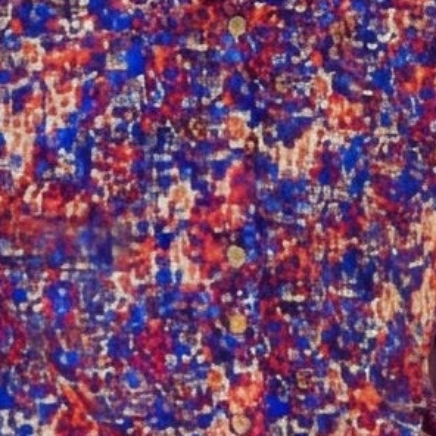 Close-up of the blue shirt showing the abstract print and textured linen blend fabric.