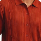 red textured knit walking suit shirt detail