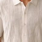 white textured knit walking suit shirt detail