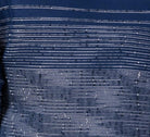 close-up of navy walking suit shirt with tonal horizontal striped detailing by Montique