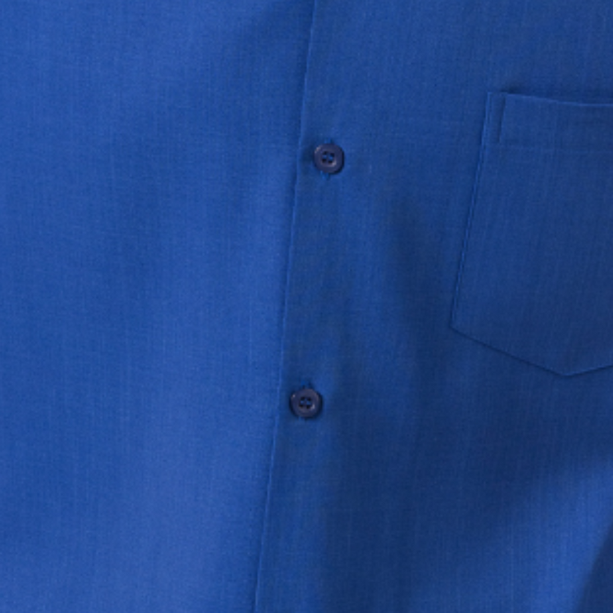 Close-up of cobalt 100% polyester fabric showing the solid texture and button detail