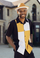 close-up of gold color block walking suit shirt